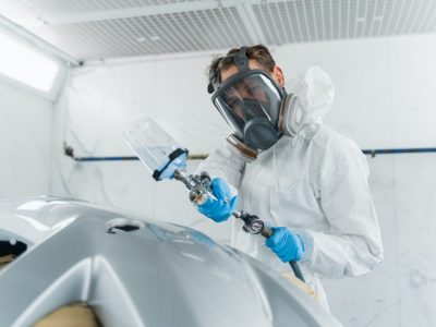 car-mechanic-painting-car-bumper-with-spray-gun.jpg car-mechanic-painting-car-bumper-with-spray-gun.jpg